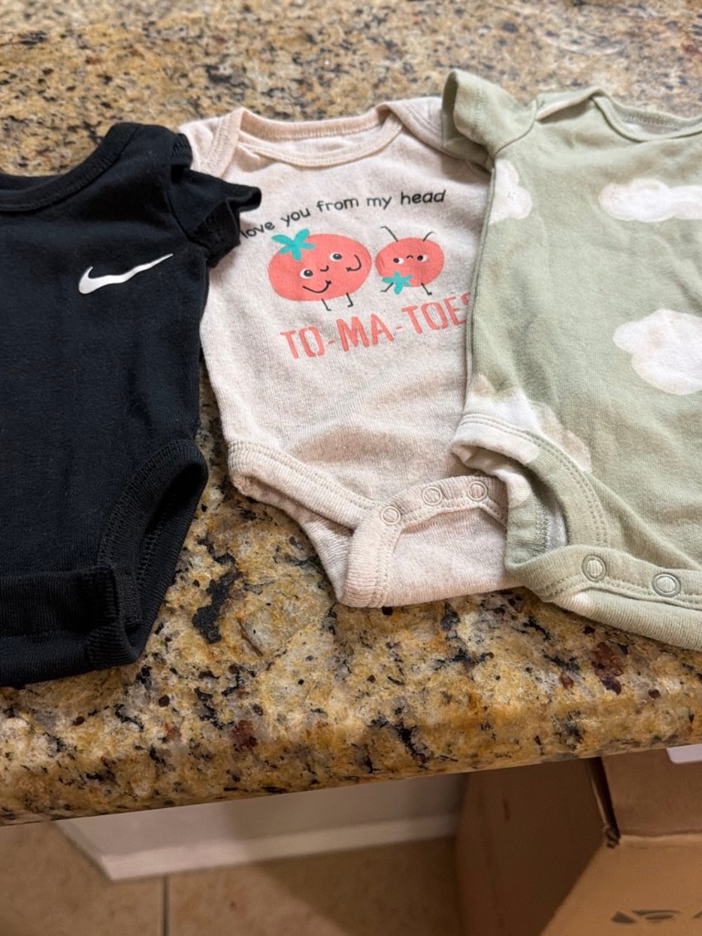 Nike Black Baby One-Piece Bodysuit with Swoosh Logo